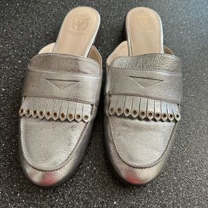 Cole Haan mules.  9.5 women. Beautiful silver to add some sparkle.